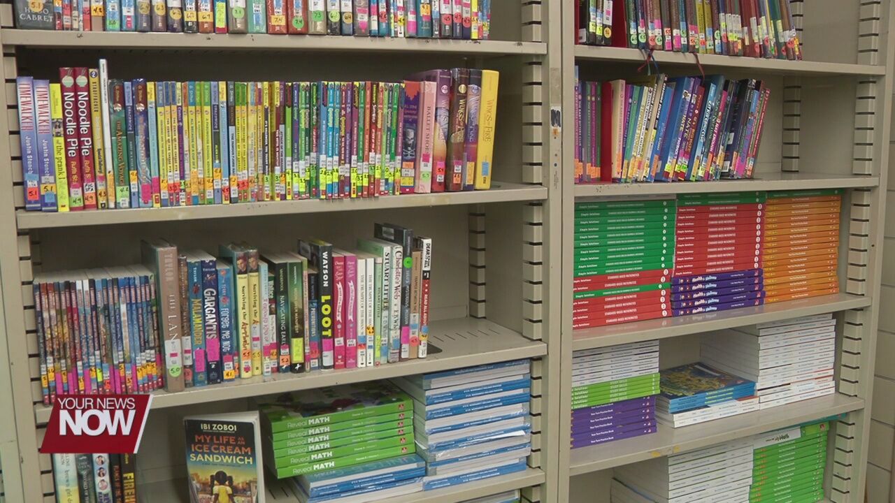 Grant money to help expand St. Rose school library